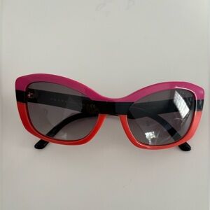 100% authentic -Prada pink and orange sunglasses- good condition no scratches.